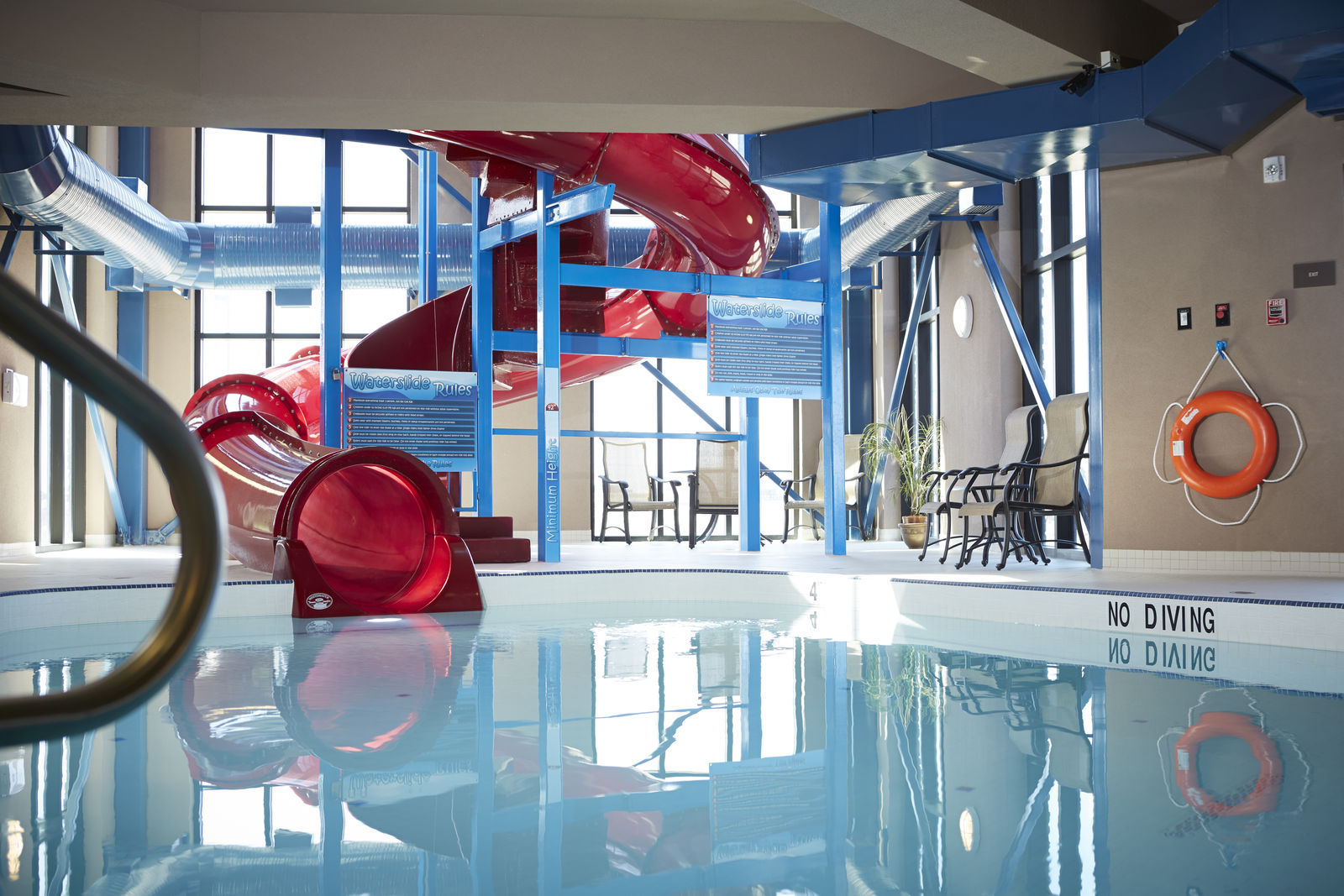 Cool off at our Saskatoon hotel with waterslide and pool after a long day at the EX.